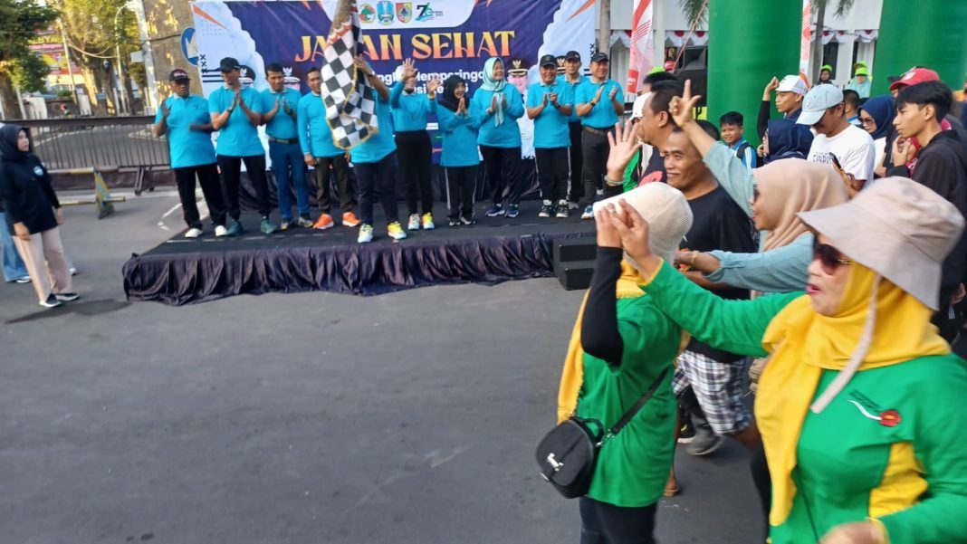 jempolindo, jember, harkopnas, jalan sehat